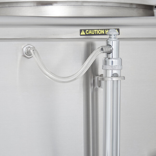 A Cecilware stainless steel coffee urn with a hose and handle.