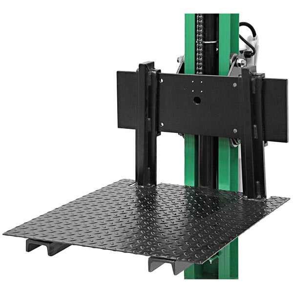 A black and green metal platform with green pads attached to a black and green Valley Craft Versa-Lift pallet forks attachment.