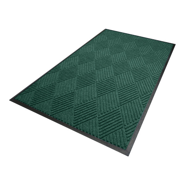A rectangular green mat with a diamond pattern and a black border.