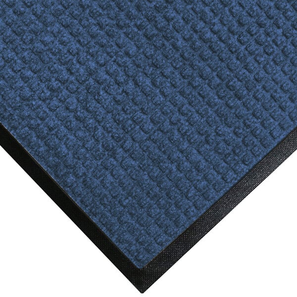 A medium blue WaterHog mat with a black rubber border.