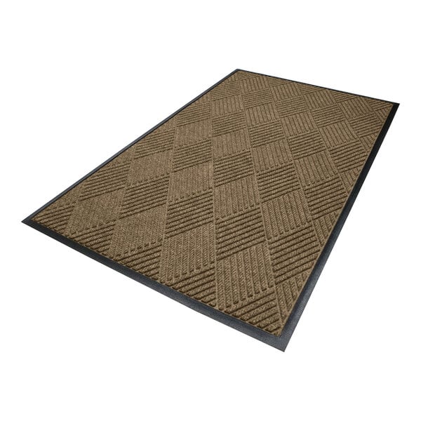 A rectangular mat with a textured, checkered pattern in a khaki color and a black rubber border.