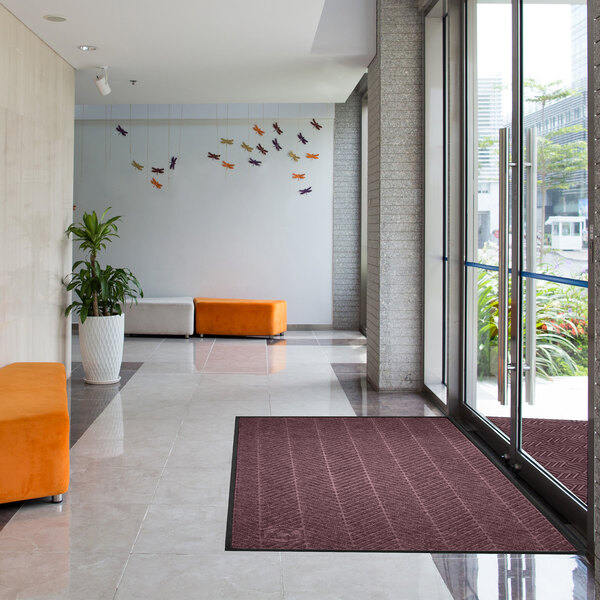 M+A Matting WaterHog Eco Elite Classic 3' x 8' 6" Maroon Mat with Classic Border and Universal Cleated Backing