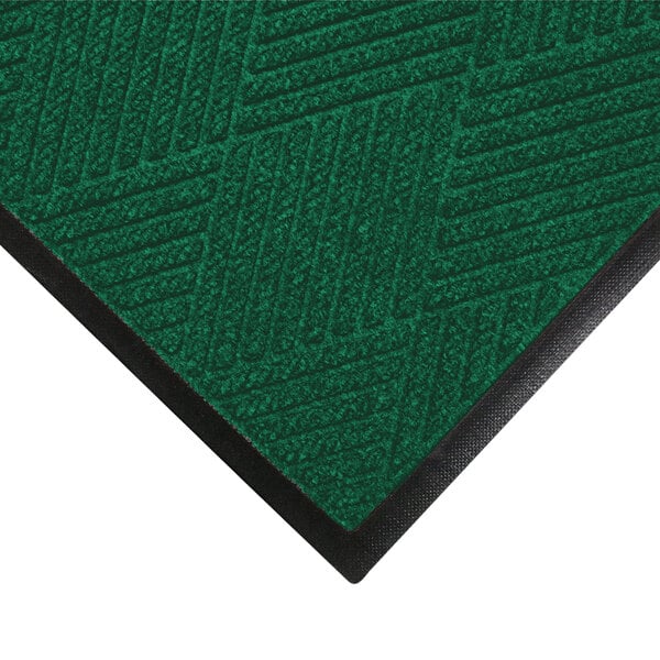 A green WaterHog Eco Premier doormat with black rubber trim.