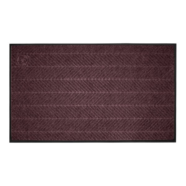 A rectangular maroon mat with a subtle chevron pattern and a black border.
