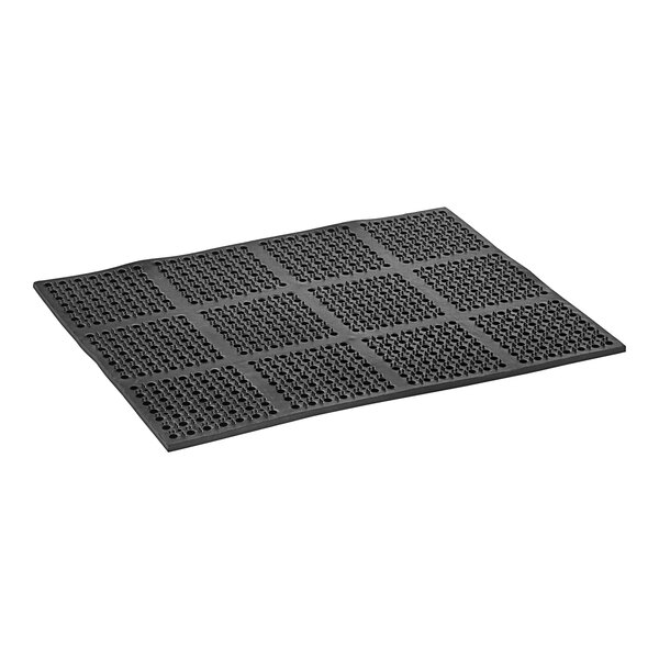 A black rubber mat with holes.