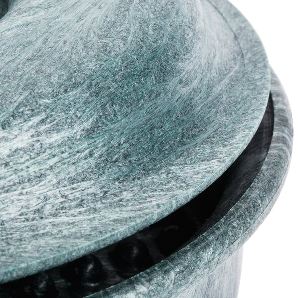 A close up of a green polyethylene HS Inc. "Tortilla Pleezer" container.