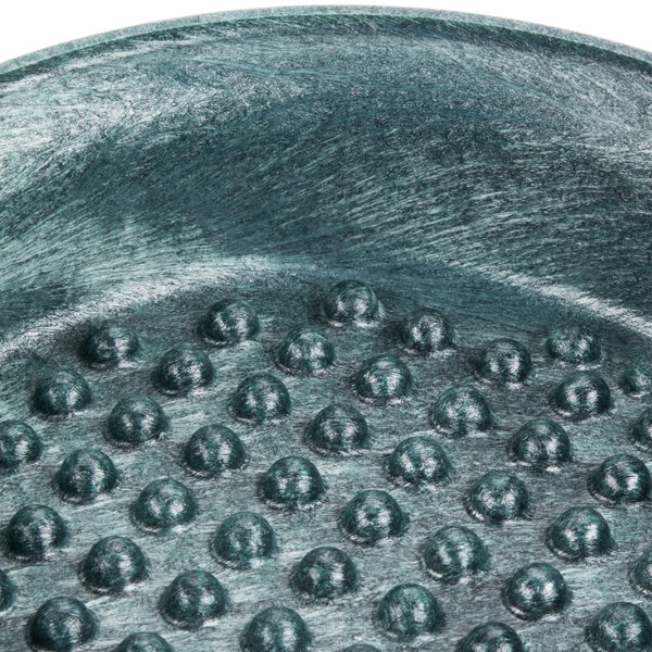 An HS Inc. Tortilla Pleezer server with many small circles in the surface.