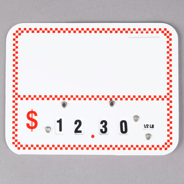 A white rectangular deli tag wheel with red and white checkered labels.