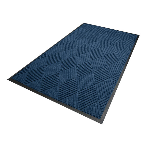 A rectangular navy mat with a diamond pattern and a black rubber border.