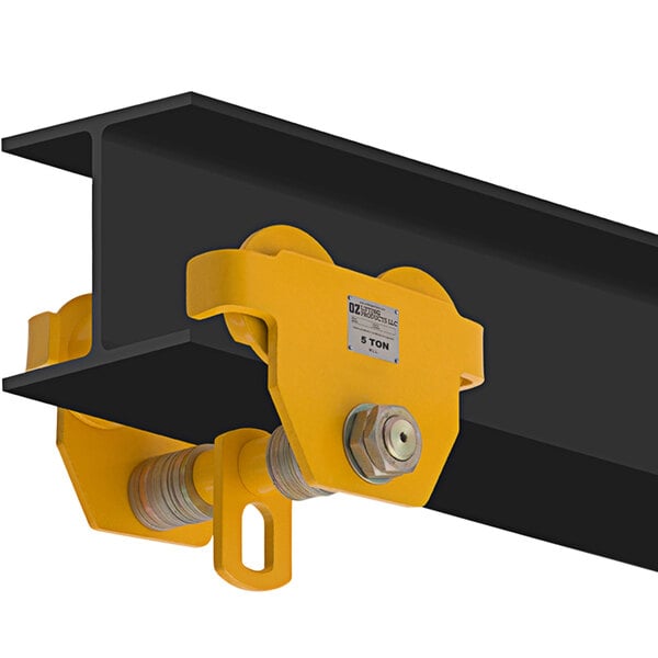 A yellow and black metal OZ Lifting Products beam trolley.