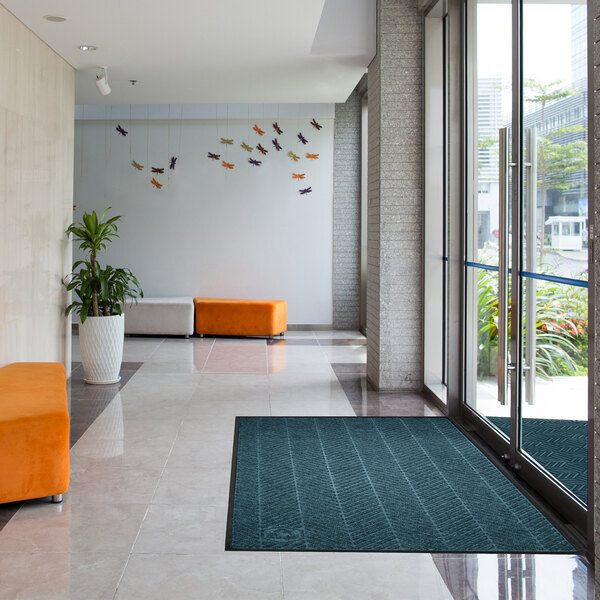 M+A Matting WaterHog Eco Elite Classic 3' x 8' 6" Indigo Mat with Classic Border and Universal Cleated Backing