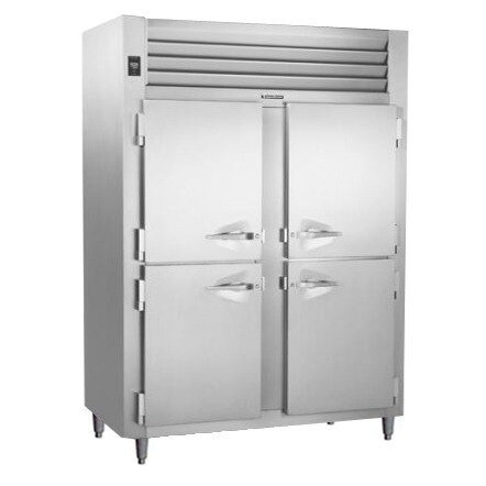 A large stainless steel Traulsen reach in refrigerator with two half doors.