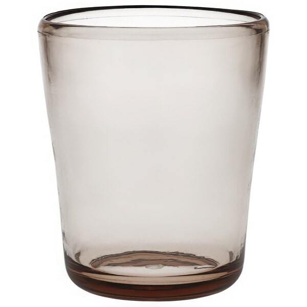 A clear Fortessa Tritan plastic rocks glass with a brown rim.