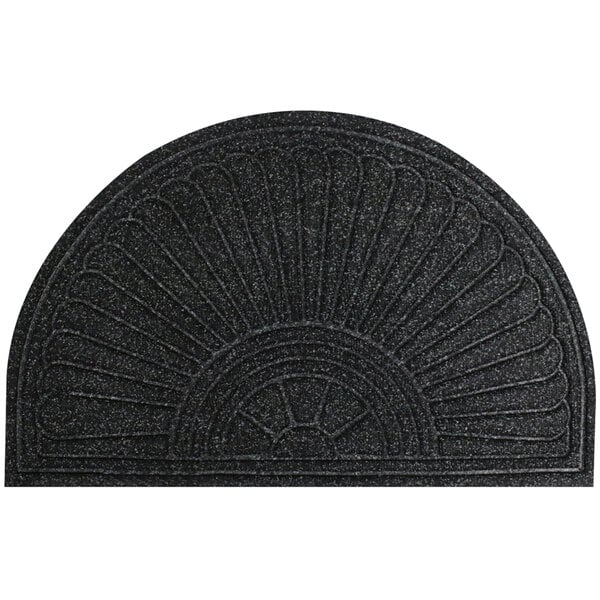 A black doormat with a fan shaped design.