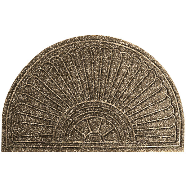 A close-up of a khaki M+A Matting WaterHog doormat with a sun design.
