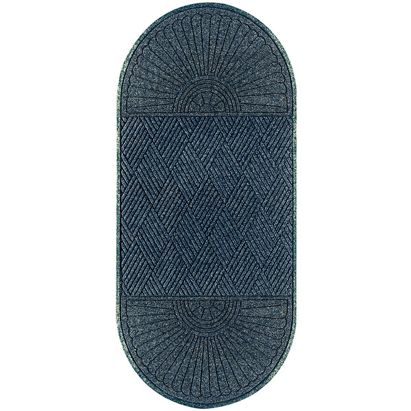 A blue rectangular WaterHog rug with a diamond design in the center.