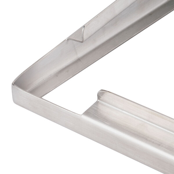 A Vollrath stainless steel adapter plate with two handles.