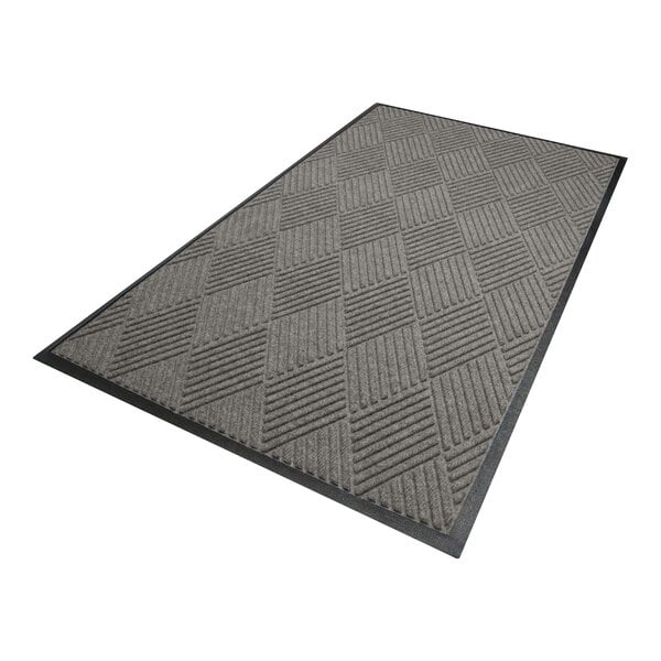 A rectangular gray mat with a diamond pattern and a black border.