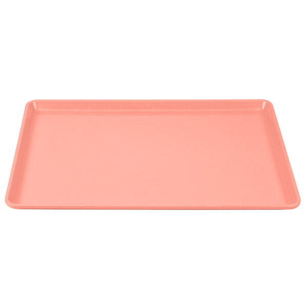 A pink rectangular Cambro dietary tray.