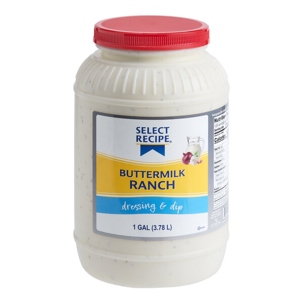 A large plastic container with a red lid, labeled as buttermilk ranch dressing and dip, holding 1 gallon (3.78 L) of product.