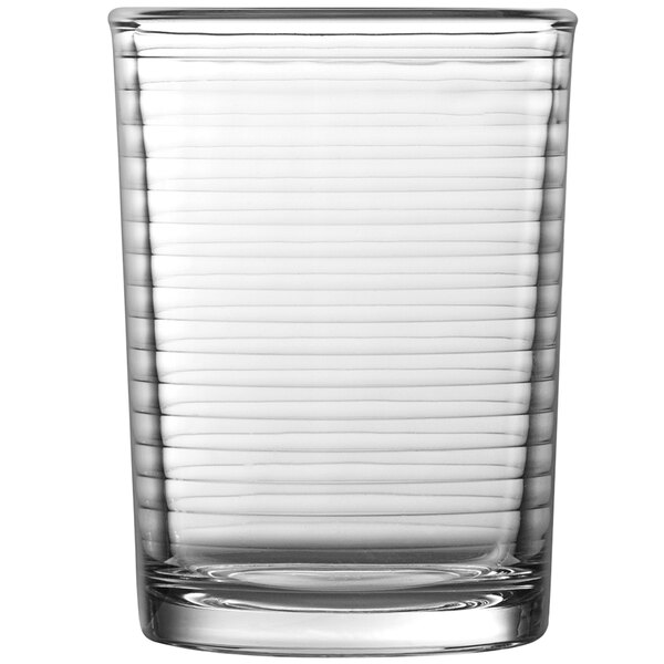 A clear Fortessa Basics Arcade Rocks glass with a stripe design.