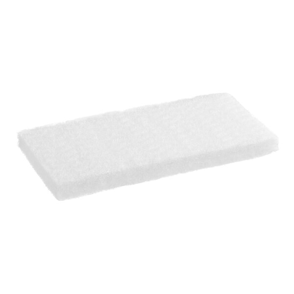 A white rectangular Lavex scouring pad.