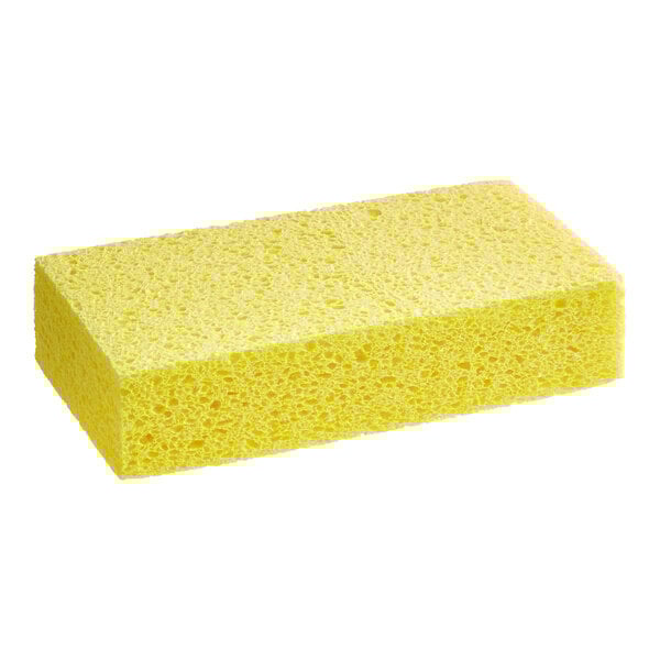 A large yellow Lavex cellulose sponge with holes.