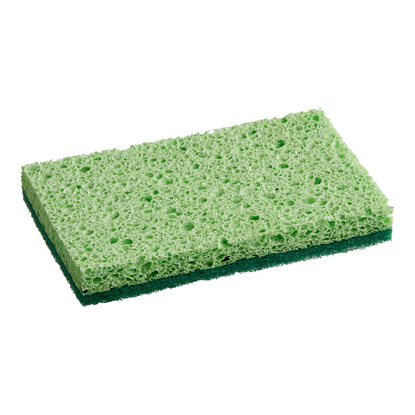 A close-up of a green Lavex sponge with holes.