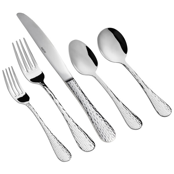 An Acopa Inspira stainless steel flatware set with a fork, spoon, and knife.