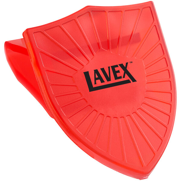 A red Lavex plastic toilet bowl clip with black text on it.