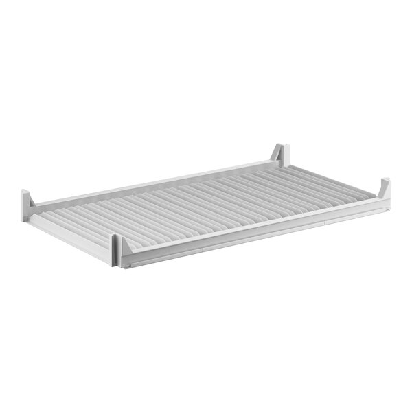 A white rectangular Cambro Camshelving® Premium vented shelf with metal slats.