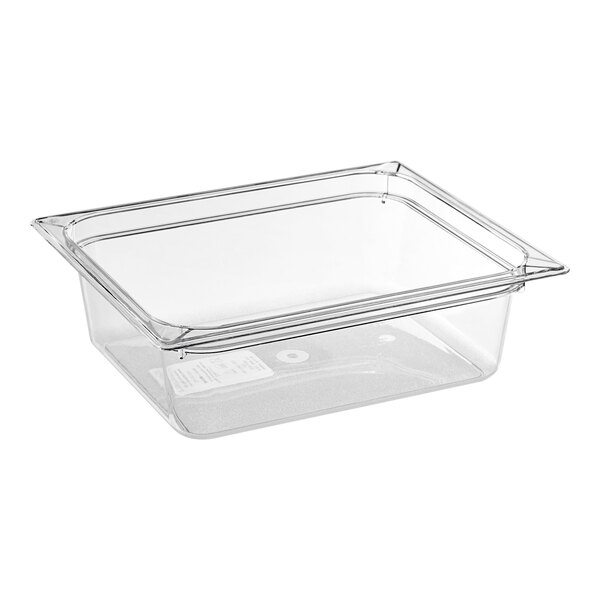 A Carlisle clear plastic food pan on a counter.