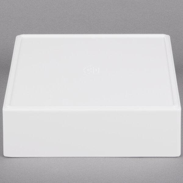 A white rectangular Cal-Mil melamine box with a lid.