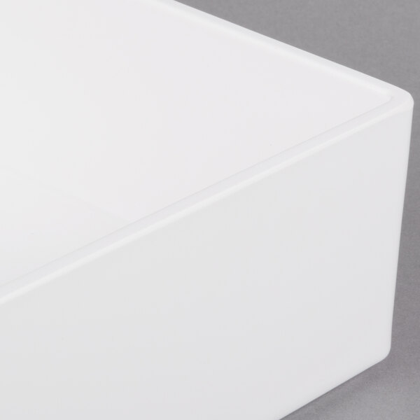 A white rectangular Cal-Mil melamine box with a lid.