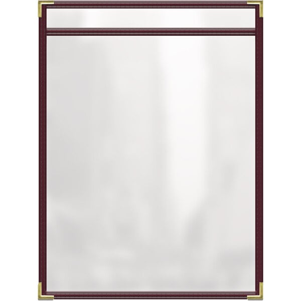 A white rectangular object with a maroon border and gold corners.