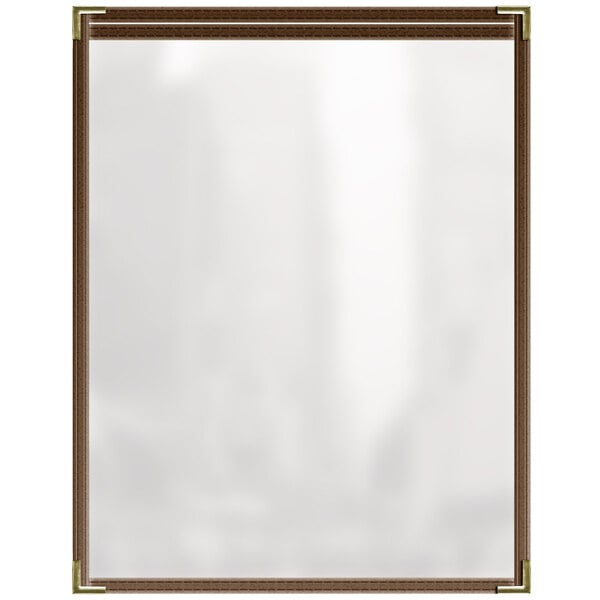 A white board with a brown frame holding two brown and gold menu pages.