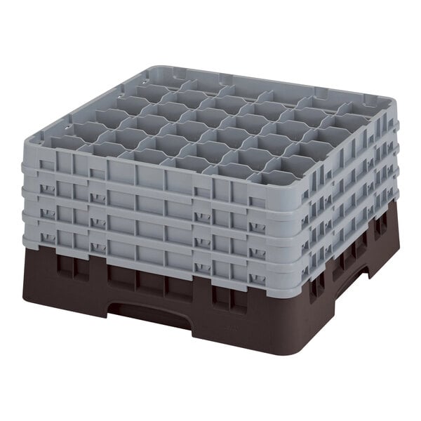 A brown plastic Cambro glass rack with many compartments.