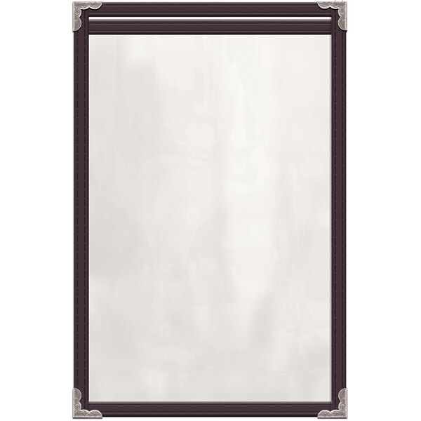 A white paper with a black border inside a brown vinyl menu cover with silver decorative corners.