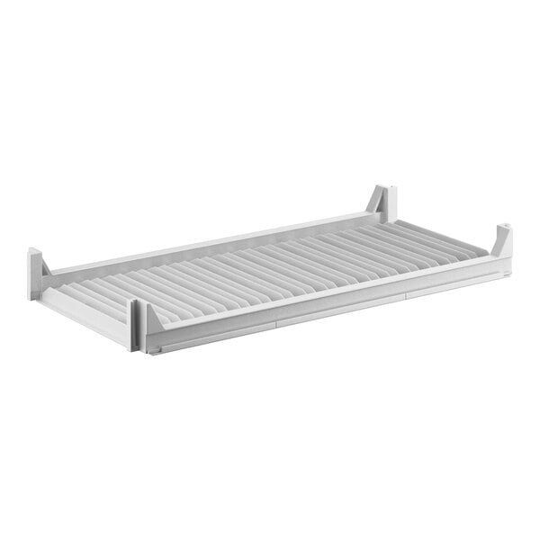 A white rectangular Cambro Camshelving® Premium vented shelf with metal slats.