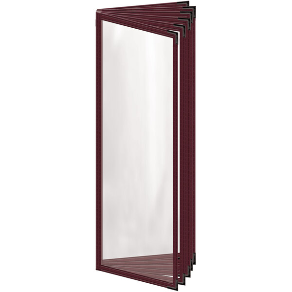 A maroon H. Risch, Inc. menu cover with black corners on a table with a mirror.