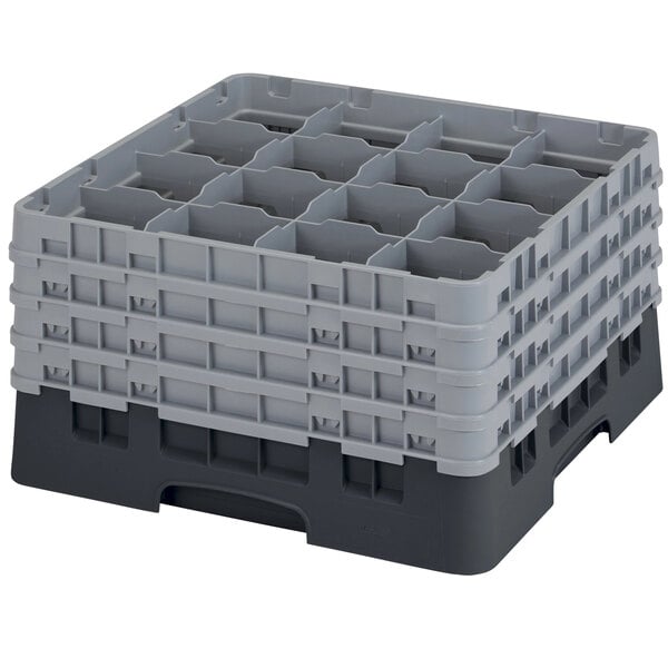 A black plastic Cambro glass rack with 16 compartments.