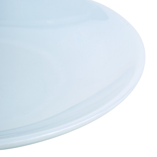 A close-up of a white Thunder Group melamine plate with a small rim.