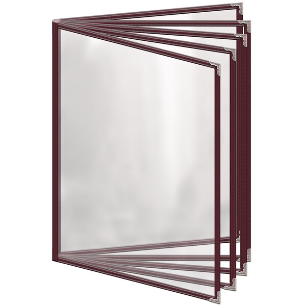A group of H. Risch, Inc. maroon vinyl menu covers with silver decorative corners.