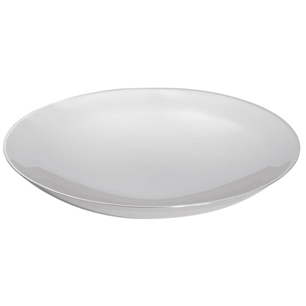 A stainless steel round platter with a rim on a white background.