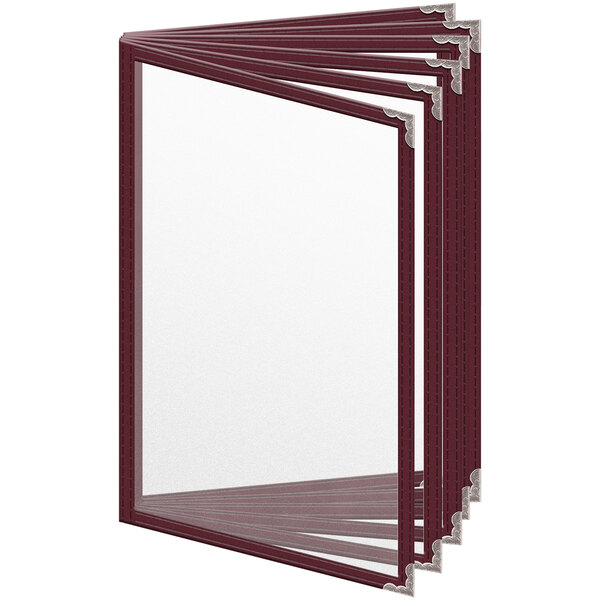 A group of maroon H. Risch, Inc. menu covers with silver corners.