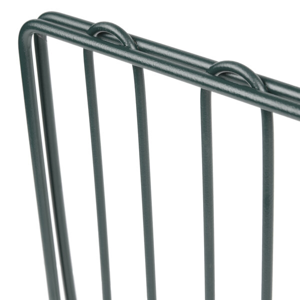 A close-up of a Metro smoked glass wire shelf divider.