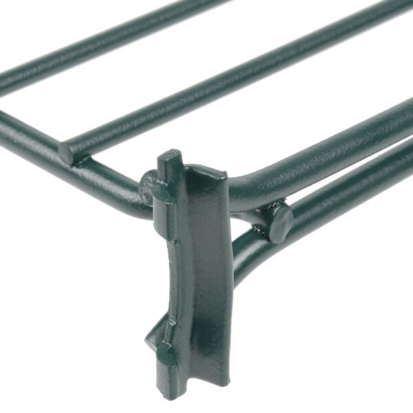 A close-up of a black metal Metro wire shelf divider.
