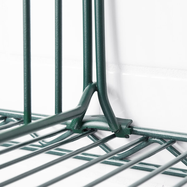 A Metro smoked glass wire shelf divider on a Metro wire rack.