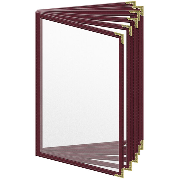 A set of maroon vinyl menu covers with gold corners.