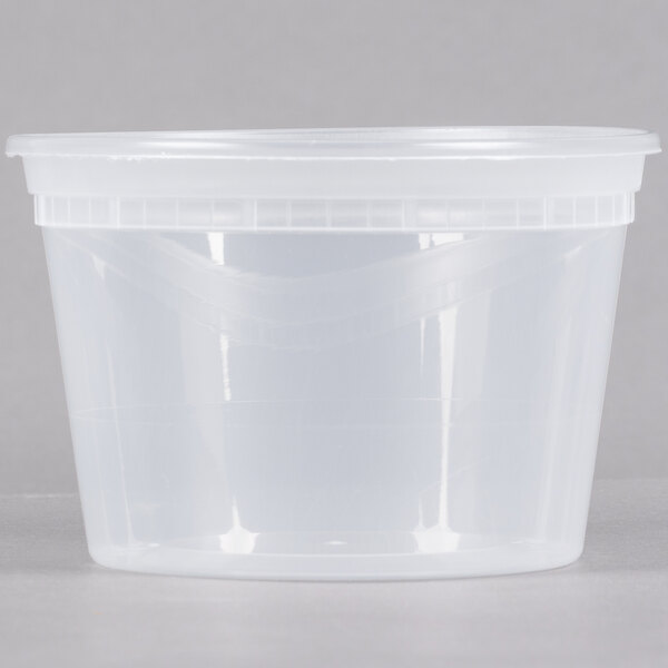 A Pactiv translucent plastic deli container with a lid.